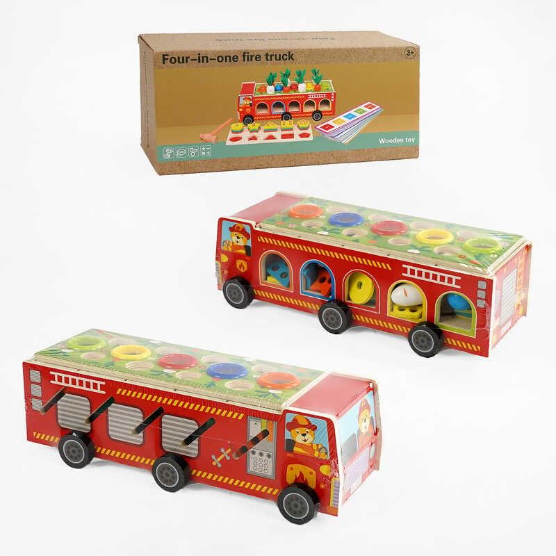 Машина логічна C 68271 дерев`яна, стукалка, гра “Грядка з морквинками”, сортер, знімні ігрові пан...